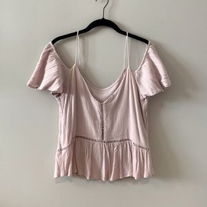 Elegant baby pink cold shoulder top from Tilly’s. Size medium.